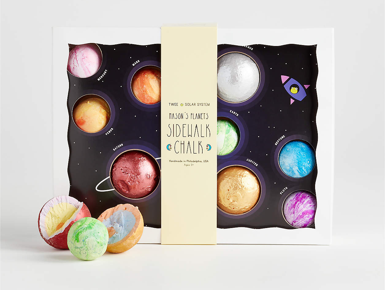 the box of planet-inspired chalk with three loose pieces on the outside