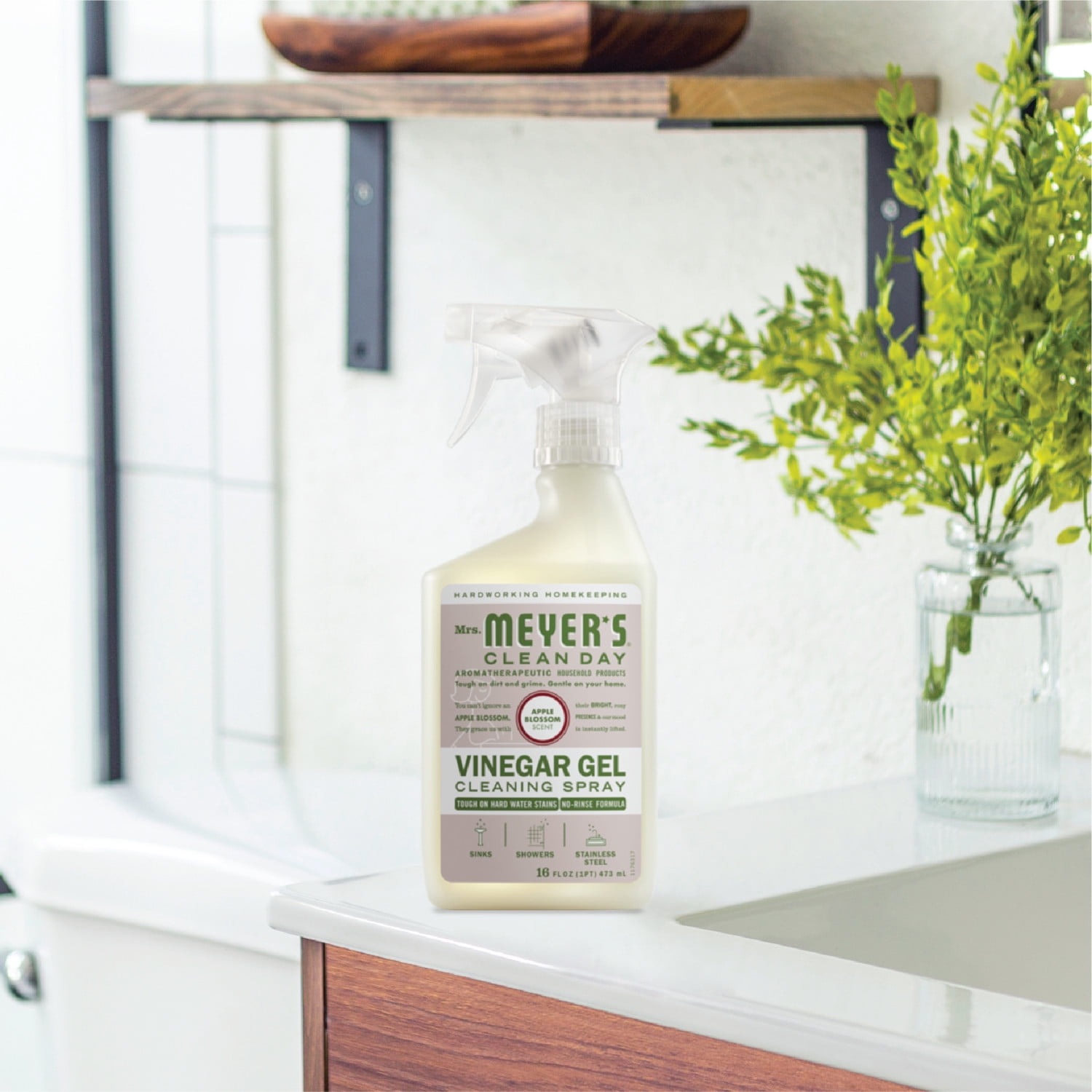 Meyer’s Vinegar Gel Cleaning Spray connected  a room  antagonistic  adjacent   a plant, with modern   shelving successful  the background