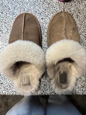 reviewer's ugg slippers broadside by side, 1 cleanable and the different dirty