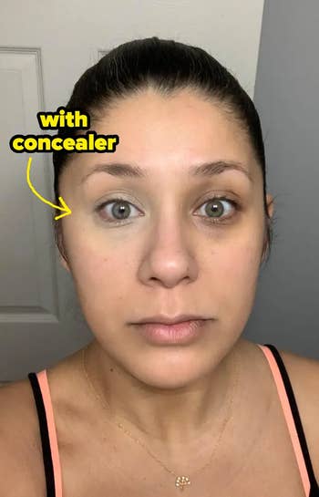 reviewer showing the effect of concealer applied under one eye (looking brighter and more even)