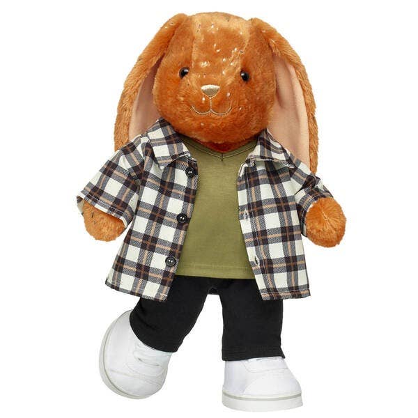 a pumpkin spice bunny stuffed animal in a jacket and black leggings