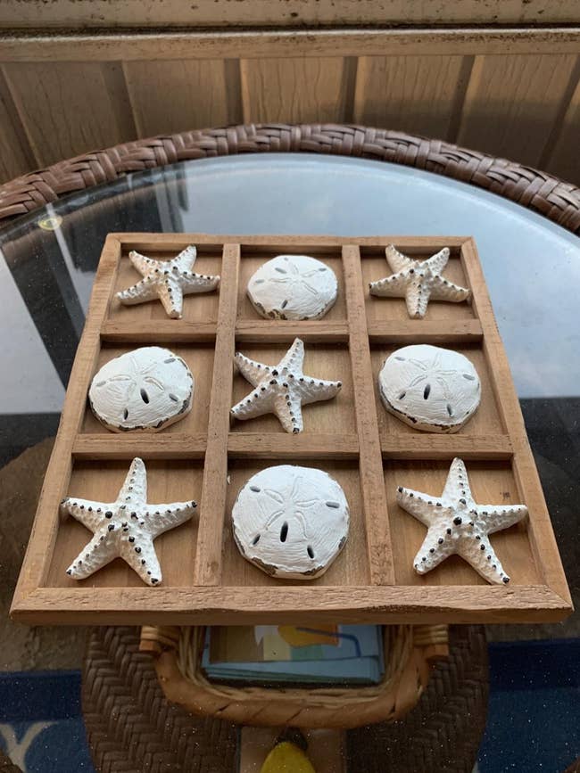 reviewer's nautical tic tac toe game on a coffee table