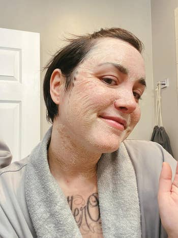 Person with a skincare disguise connected their face