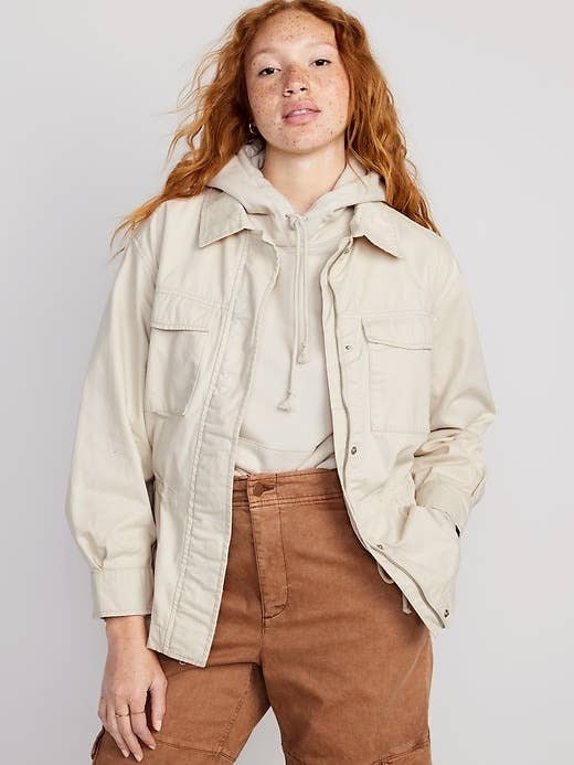 model in a casual beige jacket