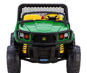 Front view of green, yellow, and black John Deere ride-on toy