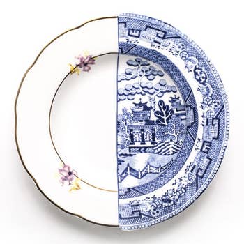 bowl that's half white with flowers and half blue and white landscape print
