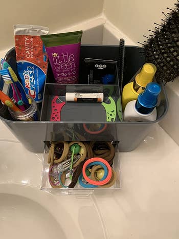 the grey storage bin on a reviewer's bathroom counter