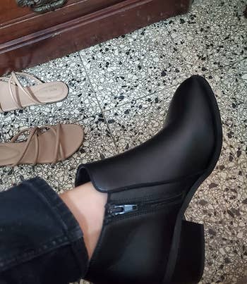 Image of reviewer wearing black bootie