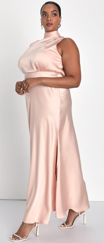 A model wearing the dress in blush