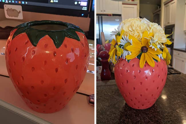 Reviewer image of strawberry-shaped vase in front of computer screen, product on top of counter with flowers inside