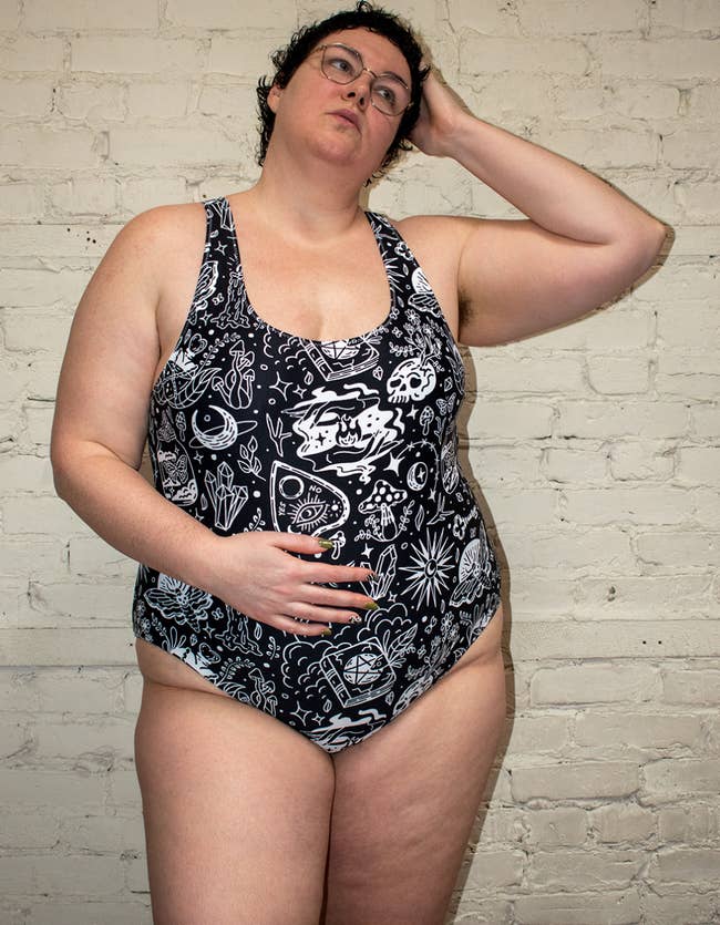model wearing one piece swimsuit