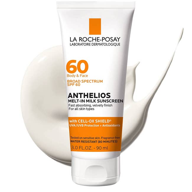 The tube of sunscreen with a swatch of the product