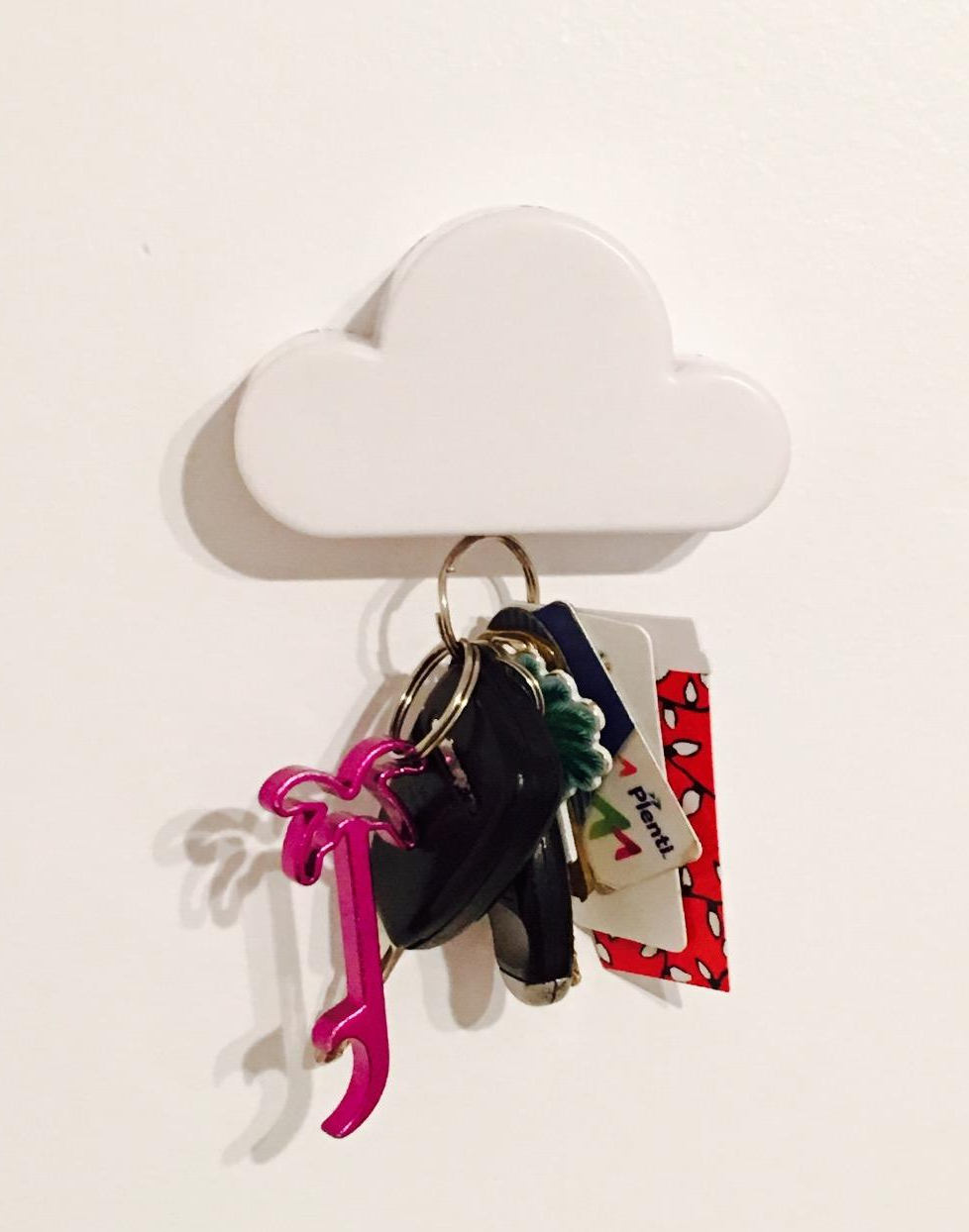 reviewer pic of cloud-shaped magnetic key holder with set of car keys on wall