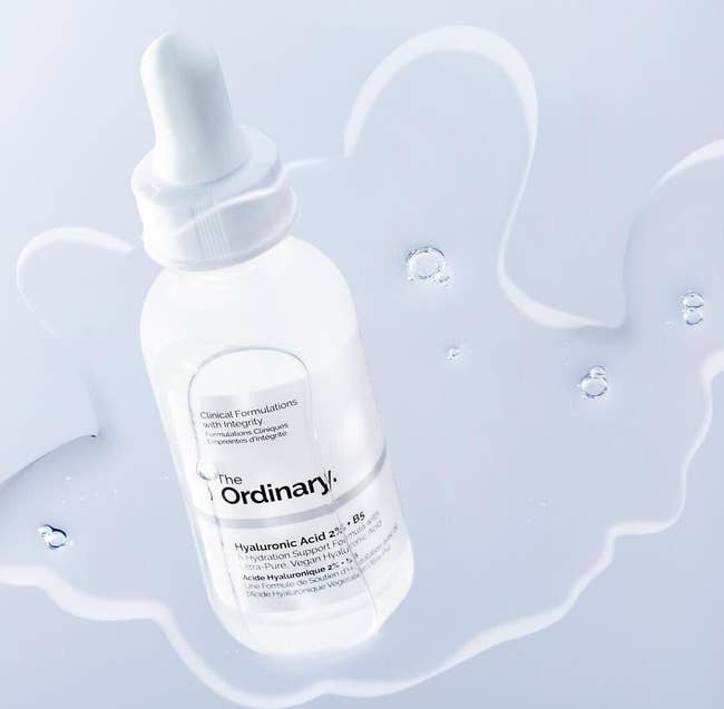 the bottle of hyaluronic acid serum covered in the serum