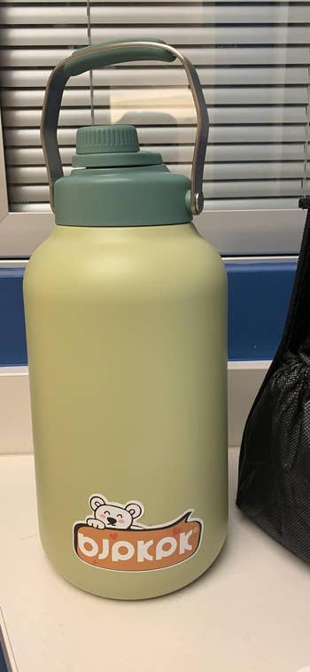reviewer's water bottle in green