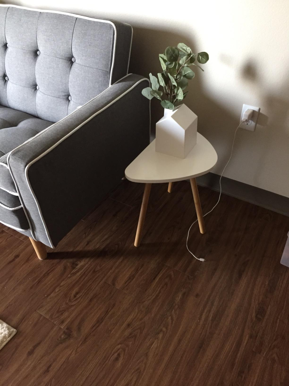 the tissue box being used as a vase for eucalyptus