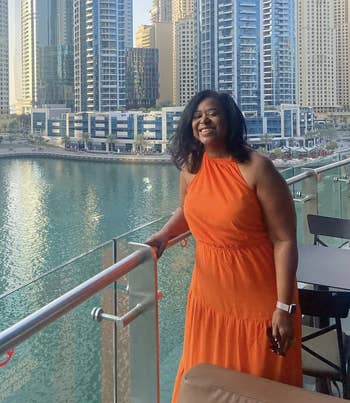reviewer wearing the formal  successful  orange