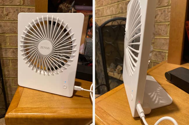 Reviewer image of white mini fan on top of desk with plug, side-view of product