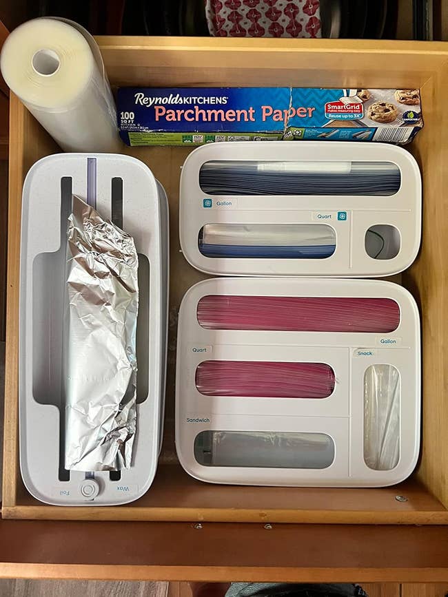  foil, parchment paper, and 3  sections for integrative  bags labeled quart, sandwich, and gallon sizes