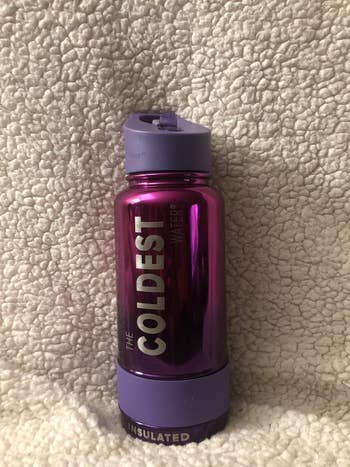 Purple insulated h2o  vessel  with 