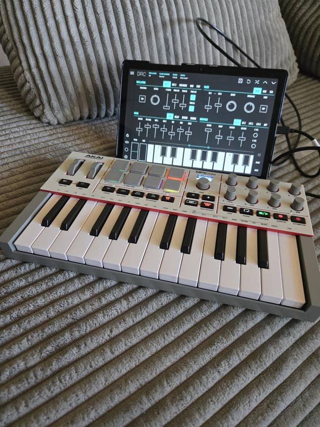 Tablet moving  a euphony  app connected to a compact MIDI keyboard