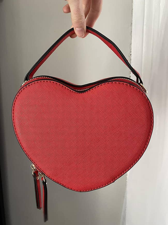 a red heart-shaped bag