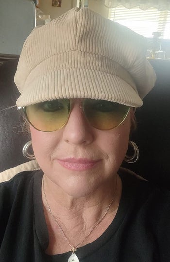 older reviewer with plump and moisturized-looking skin