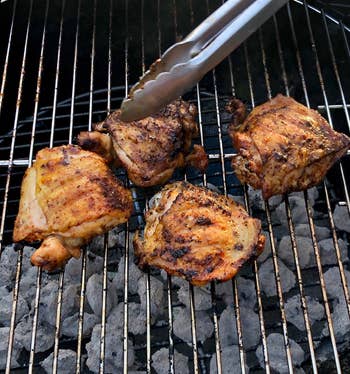 reviewer cooking chicken on the grill