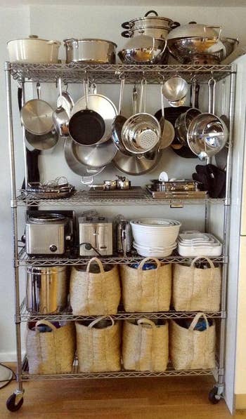 a reviewer uses the shelves for pan storage