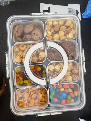  cocoa  spot   cookies, popcorn, pretzels, jelly beans, goldfish crackers, and candy-coated chocolates