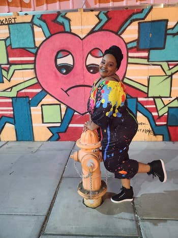 Reviewer wears achromatic  wedge sneakers 