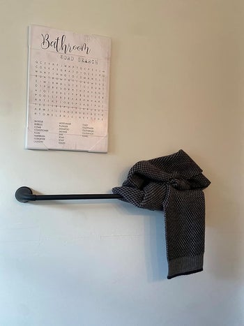 bathroom word search on reviewer's wall