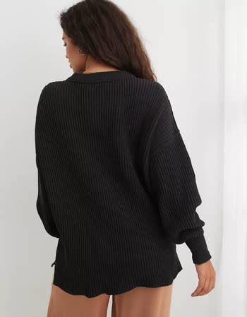 different model wearing the sweater in black