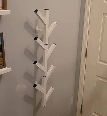 Reviewer image of white wall-mounted rack