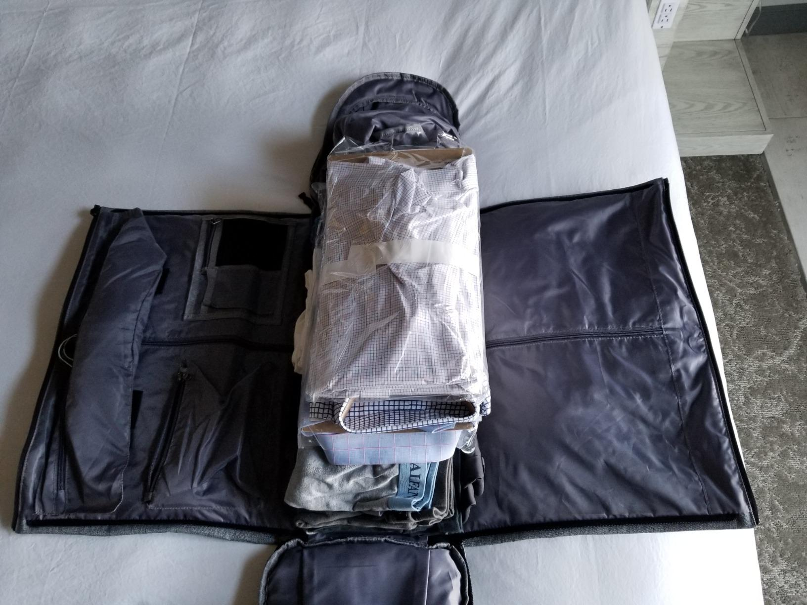 the same reviewer showing the open garment bag