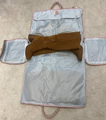 An open garment duffle bag laid flat
