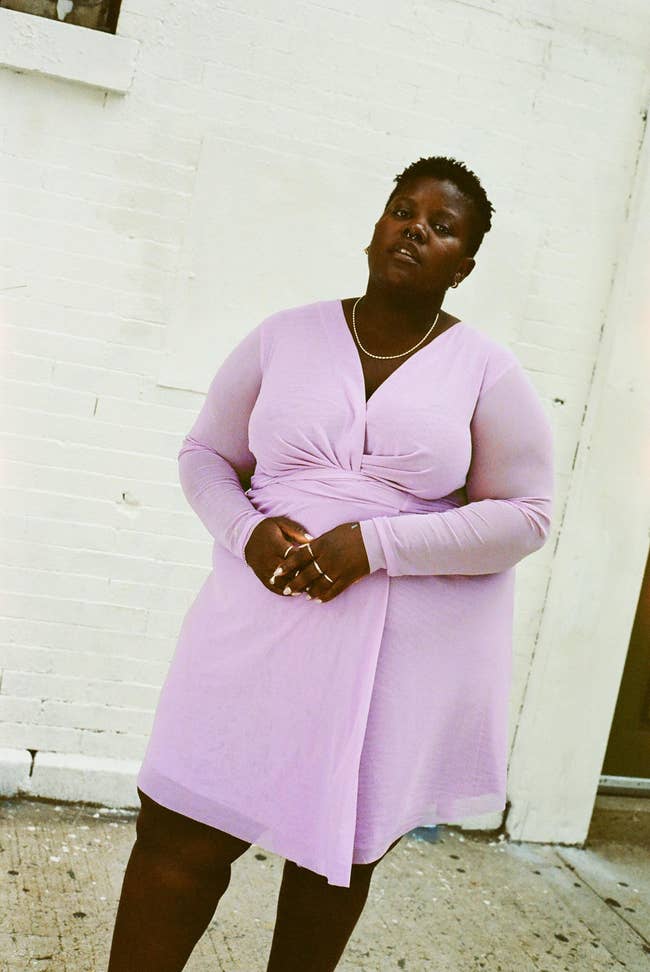 model wearing the lavender wrap dress