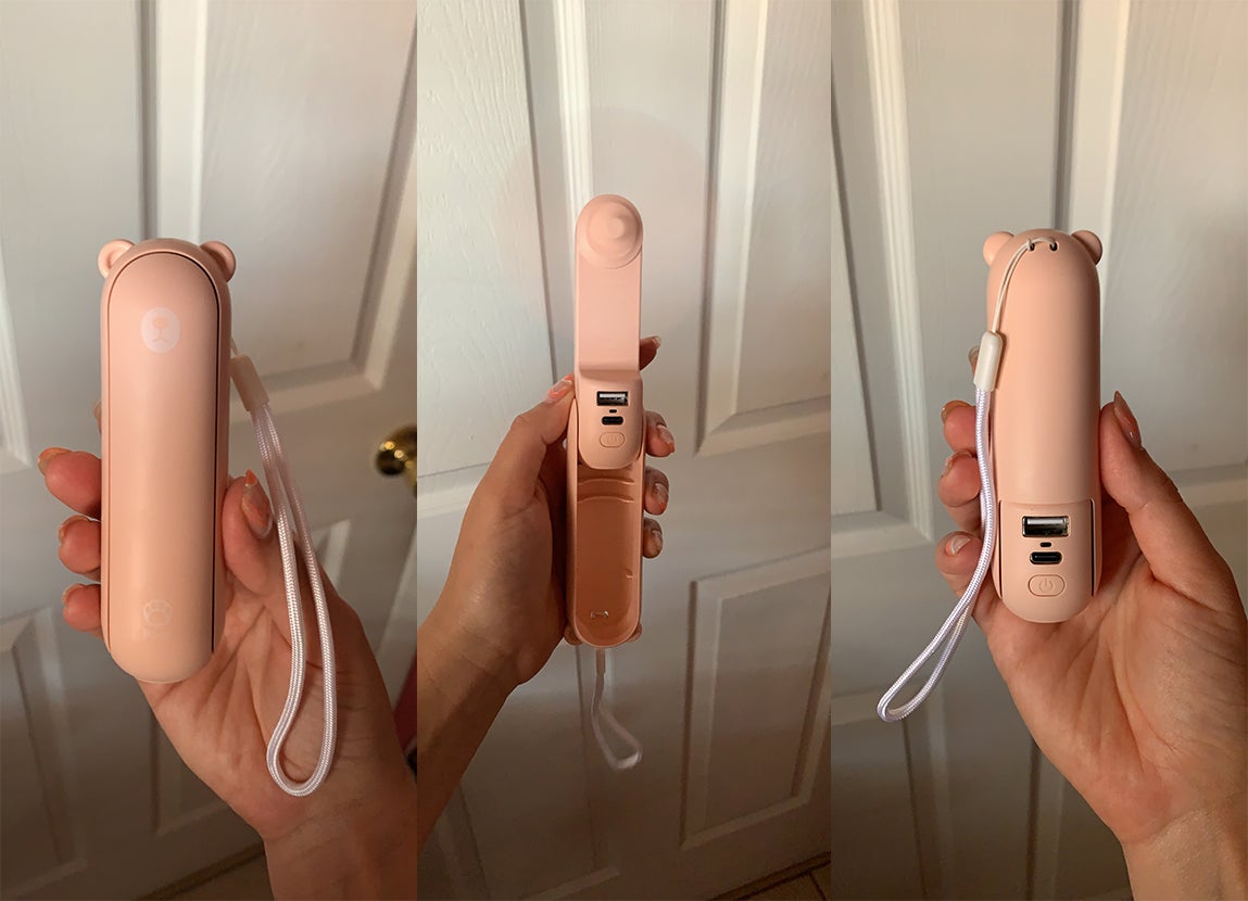 a reviewer photo of the fan closed open and showing the power bank port