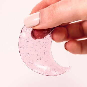 someone holding the eye gel 