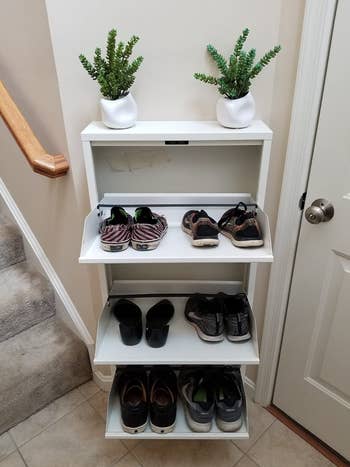 the same shoe organizer with the drawers open