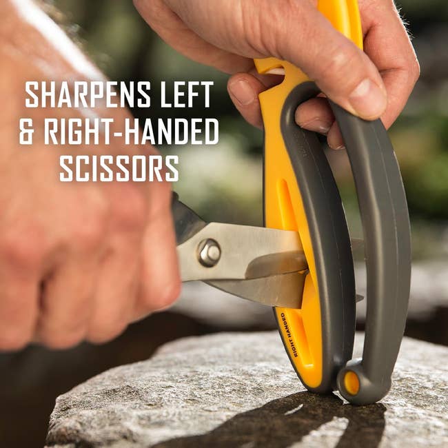 Person sharpening scissors using a handheld sharpener, suitable for both left & right-handed scissors