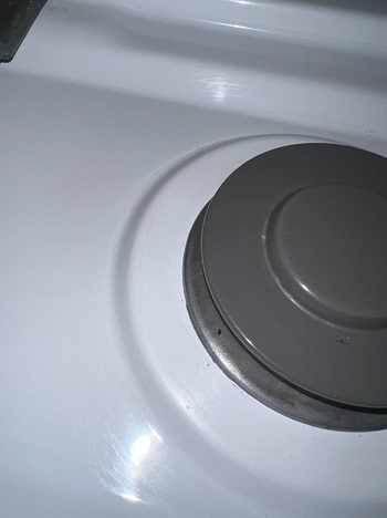 reviewer after photo of gas stove top now clean