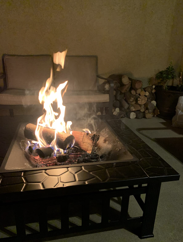 reviewer's standing fire pit on back porch 