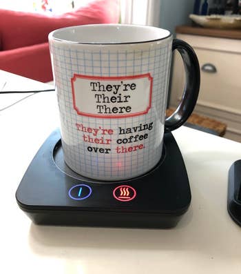 another reviewer's mug on the black warmer