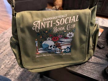Green bag with text: