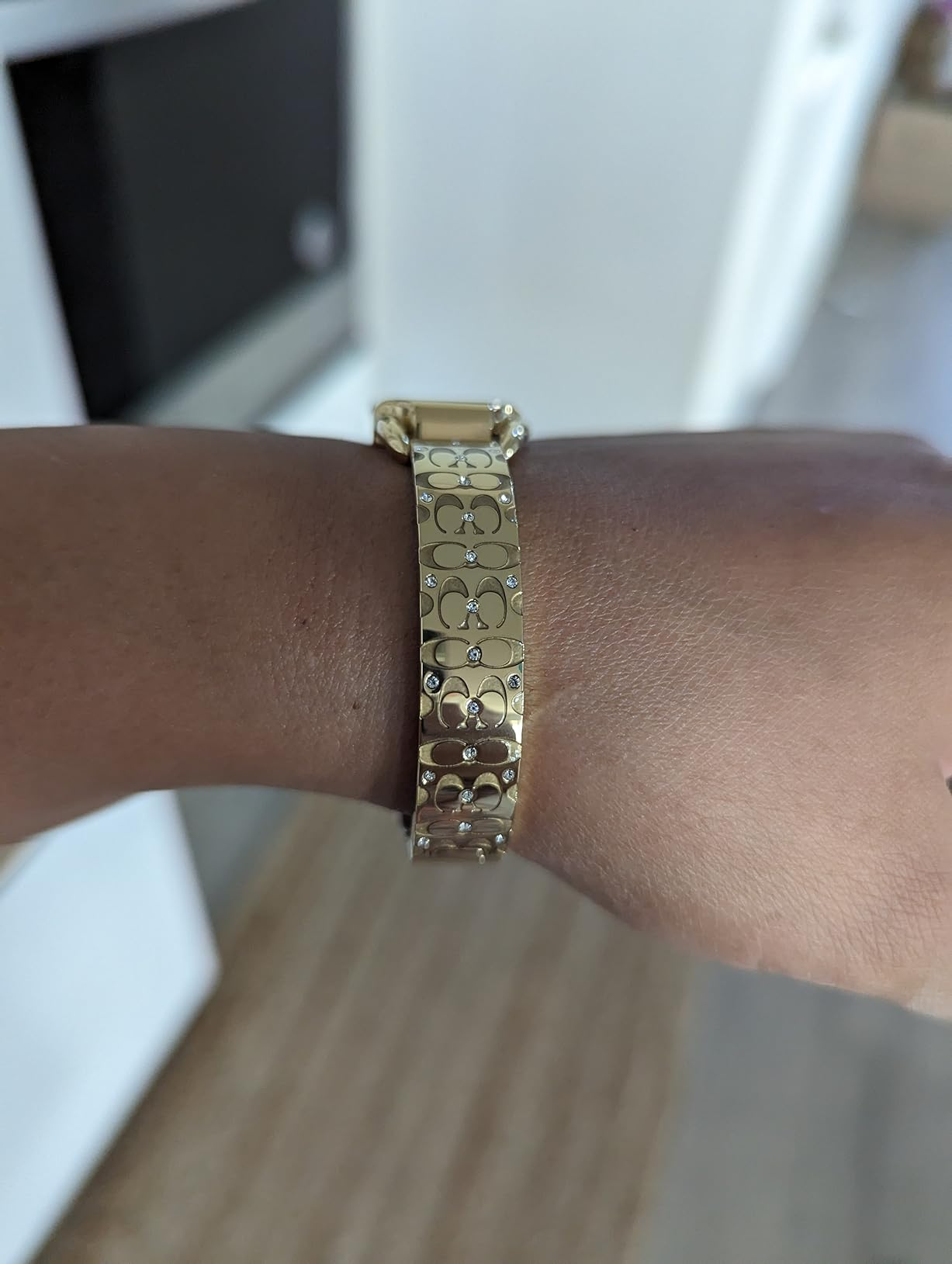 same reviewer with their wrist turned to amusement   Coach monogram logo