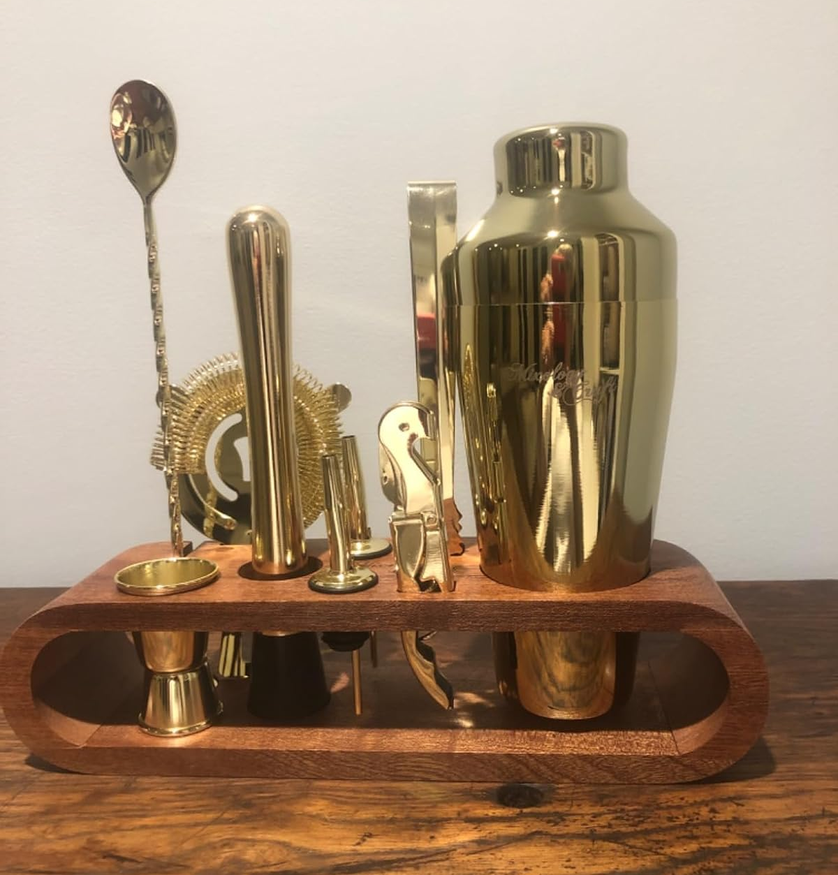 gold set in mahogany stand