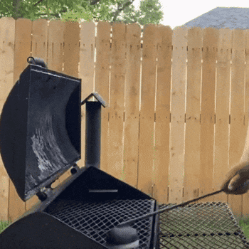 gif of onion holder being used to rub half an onion across grill