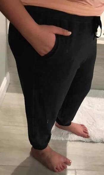 Image of reviewer wearing dark joggers