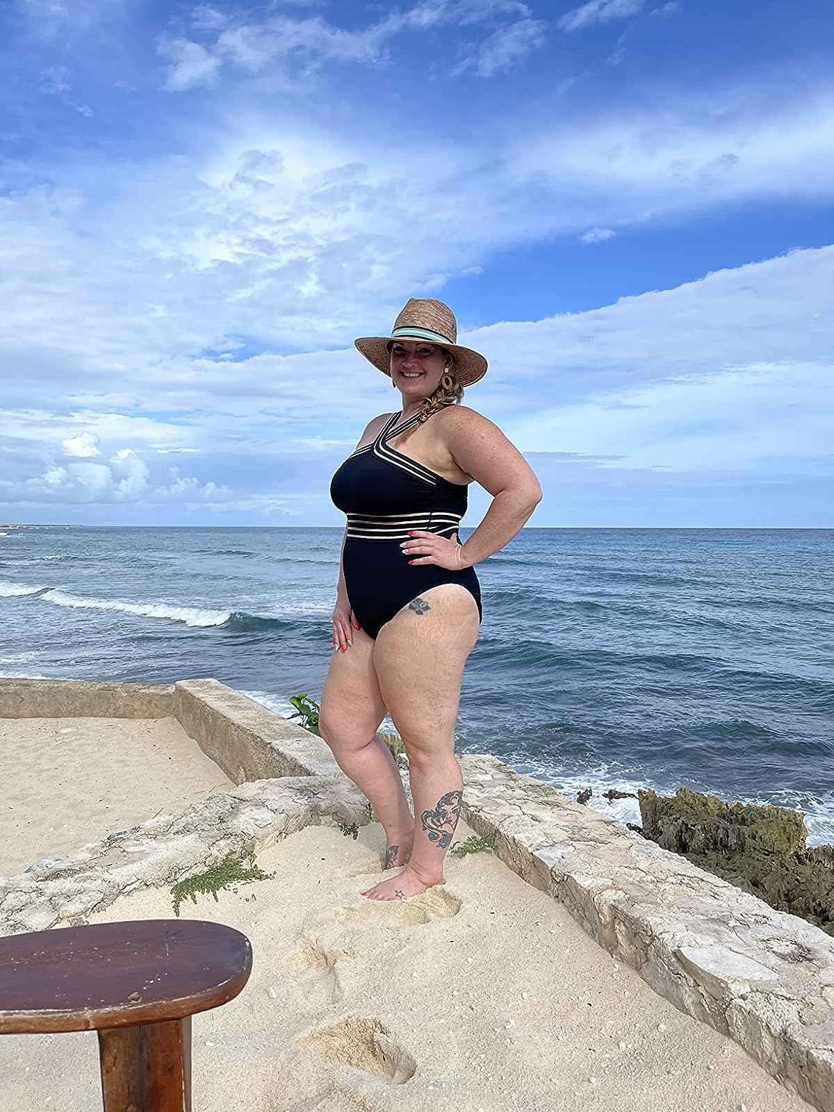 reviewer wearing the swimsuit in black